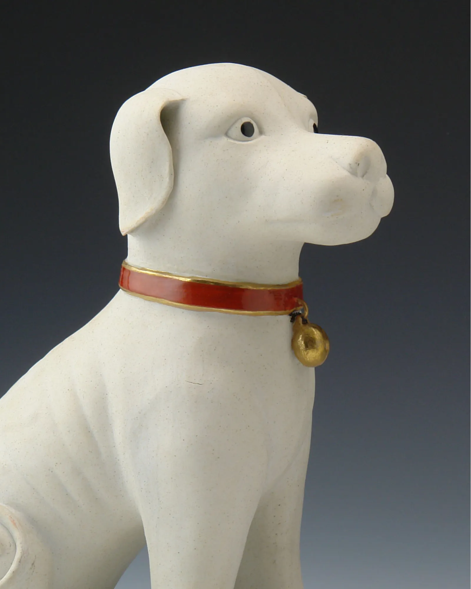 A PAIR OF 11” WHITE DOGS