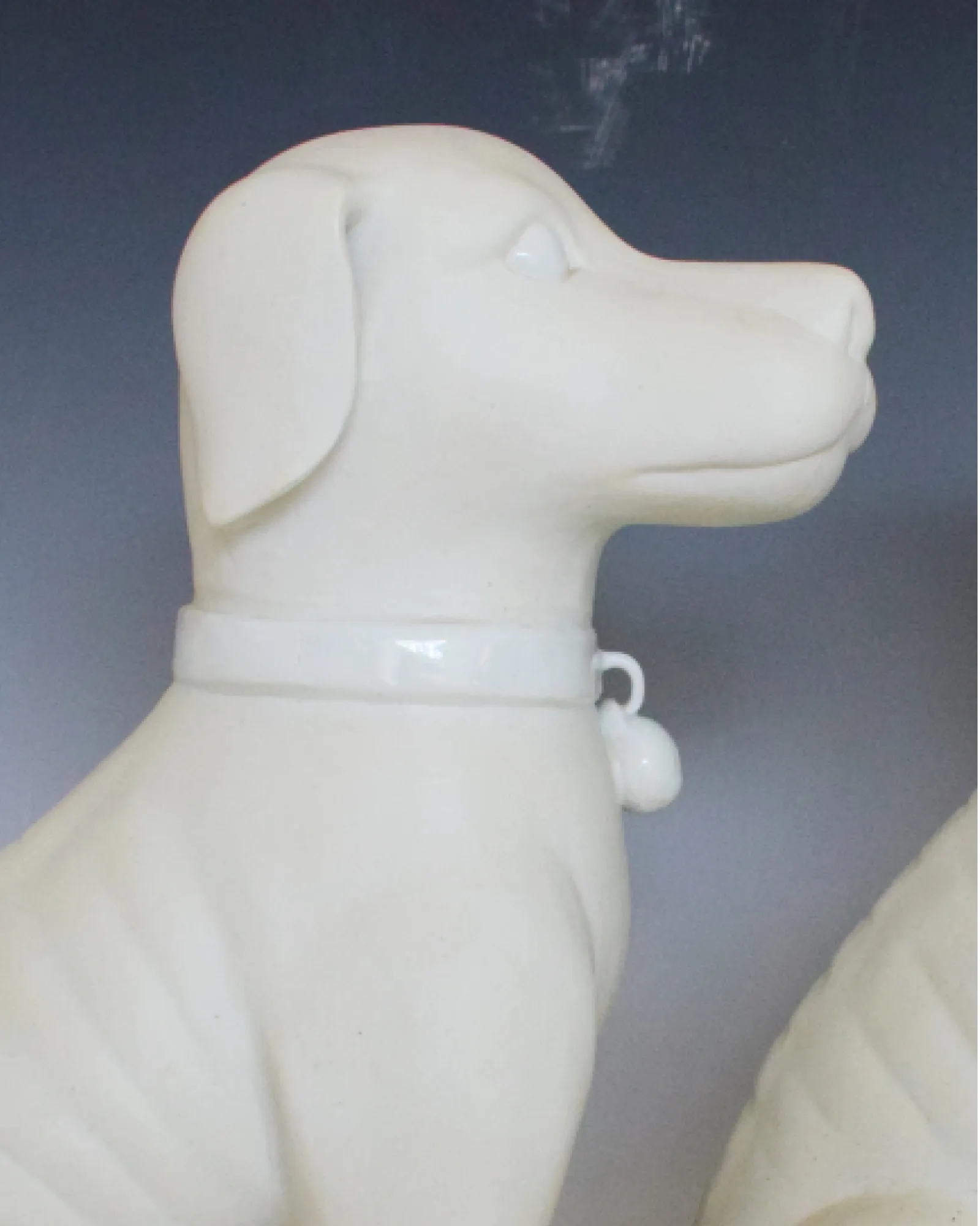 A PAIR OF 11” WHITE DOGS