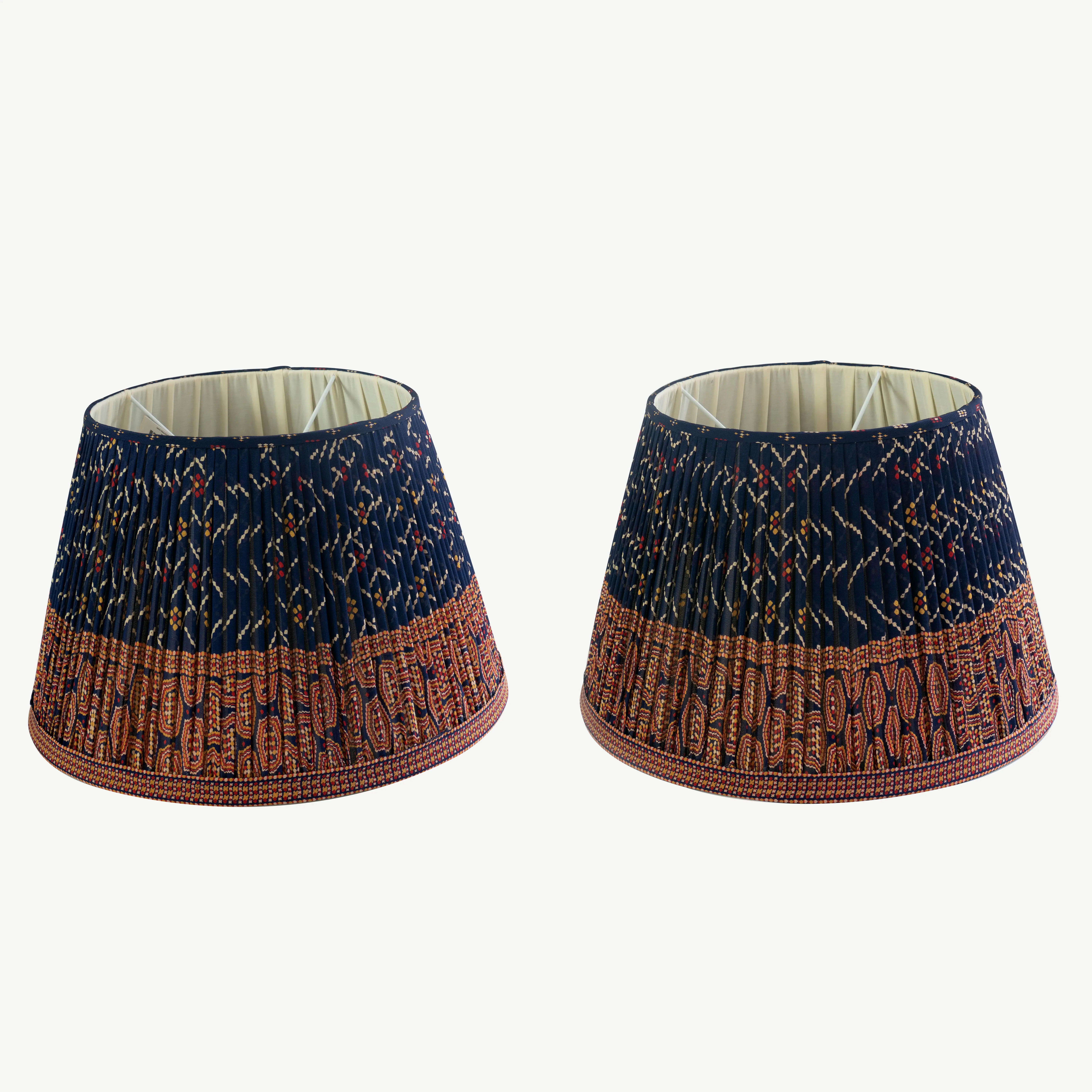 A pair of blue lampshades